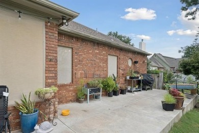 Enjoy the sunset from the back patio overlooking the 18th hole on Battle Creek Golf Course in Oklahoma - for sale on GolfHomes.com, golf home, golf lot