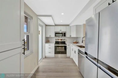 Completely and magnificently updated PENTHOUSE unit with on Palm-Aire Country Club and Resort - Palms in Florida - for sale on GolfHomes.com, golf home, golf lot