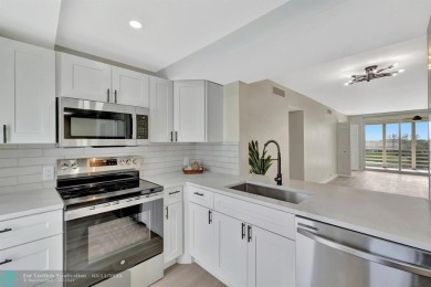 Completely and magnificently updated PENTHOUSE unit with on Palm-Aire Country Club and Resort - Palms in Florida - for sale on GolfHomes.com, golf home, golf lot