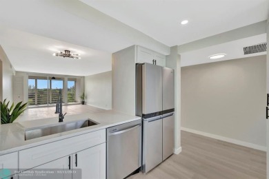 Completely and magnificently updated PENTHOUSE unit with on Palm-Aire Country Club and Resort - Palms in Florida - for sale on GolfHomes.com, golf home, golf lot
