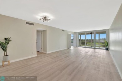 Completely and magnificently updated PENTHOUSE unit with on Palm-Aire Country Club and Resort - Palms in Florida - for sale on GolfHomes.com, golf home, golf lot