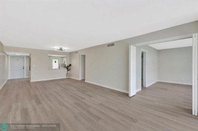 Completely and magnificently updated PENTHOUSE unit with on Palm-Aire Country Club and Resort - Palms in Florida - for sale on GolfHomes.com, golf home, golf lot