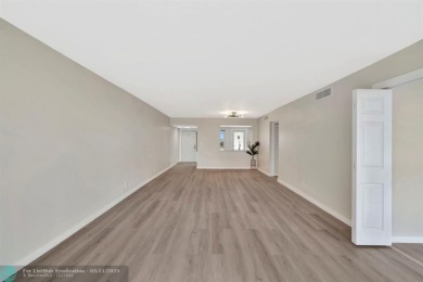 Completely and magnificently updated PENTHOUSE unit with on Palm-Aire Country Club and Resort - Palms in Florida - for sale on GolfHomes.com, golf home, golf lot