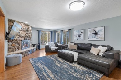 Welcome home to this stunning 5-bedroom, 4-bathroom residence - on Elk River Golf Club in Minnesota - for sale on GolfHomes.com, golf home, golf lot