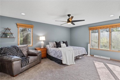 Welcome home to this stunning 5-bedroom, 4-bathroom residence - on Elk River Golf Club in Minnesota - for sale on GolfHomes.com, golf home, golf lot