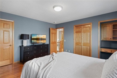 Welcome home to this stunning 5-bedroom, 4-bathroom residence - on Elk River Golf Club in Minnesota - for sale on GolfHomes.com, golf home, golf lot