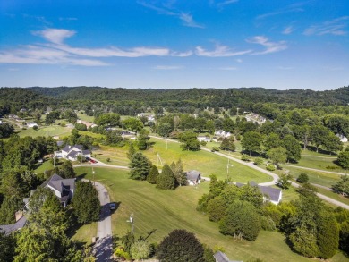 Enjoy golf course living in the desirable Esquire subdivision on The Esquire Country Club in West Virginia - for sale on GolfHomes.com, golf home, golf lot