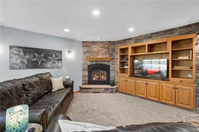 Welcome home to this stunning 5-bedroom, 4-bathroom residence - on Elk River Golf Club in Minnesota - for sale on GolfHomes.com, golf home, golf lot