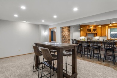 Welcome home to this stunning 5-bedroom, 4-bathroom residence - on Elk River Golf Club in Minnesota - for sale on GolfHomes.com, golf home, golf lot