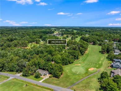 Level Corner Lot in Chickasaw Point - Steps from the Clubhouse on The Trail At Chickasaw Pointe in South Carolina - for sale on GolfHomes.com, golf home, golf lot