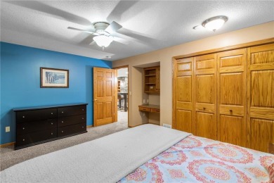 Welcome home to this stunning 5-bedroom, 4-bathroom residence - on Elk River Golf Club in Minnesota - for sale on GolfHomes.com, golf home, golf lot