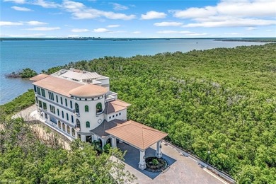 Commanding unobstructed views of Estero Bay from its on The Colony Golf and Country Club in Florida - for sale on GolfHomes.com, golf home, golf lot