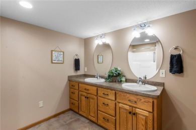 Welcome home to this stunning 5-bedroom, 4-bathroom residence - on Elk River Golf Club in Minnesota - for sale on GolfHomes.com, golf home, golf lot