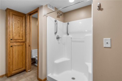 Welcome home to this stunning 5-bedroom, 4-bathroom residence - on Elk River Golf Club in Minnesota - for sale on GolfHomes.com, golf home, golf lot