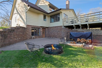 Welcome home to this stunning 5-bedroom, 4-bathroom residence - on Elk River Golf Club in Minnesota - for sale on GolfHomes.com, golf home, golf lot