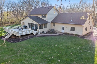 Welcome home to this stunning 5-bedroom, 4-bathroom residence - on Elk River Golf Club in Minnesota - for sale on GolfHomes.com, golf home, golf lot