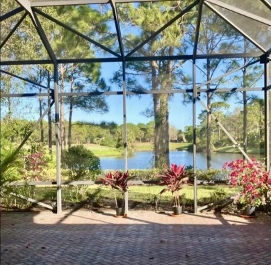 SPECTACULAR GOLF & WATER VIEWS! Nestled within the prestigious on The Legacy Golf and Tennis Club in Florida - for sale on GolfHomes.com, golf home, golf lot