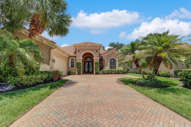 SPECTACULAR GOLF & WATER VIEWS! Nestled within the prestigious on The Legacy Golf and Tennis Club in Florida - for sale on GolfHomes.com, golf home, golf lot
