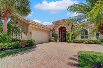 SPECTACULAR GOLF & WATER VIEWS! Nestled within the prestigious on The Legacy Golf and Tennis Club in Florida - for sale on GolfHomes.com, golf home, golf lot