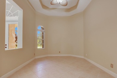 SPECTACULAR GOLF & WATER VIEWS! Nestled within the prestigious on The Legacy Golf and Tennis Club in Florida - for sale on GolfHomes.com, golf home, golf lot