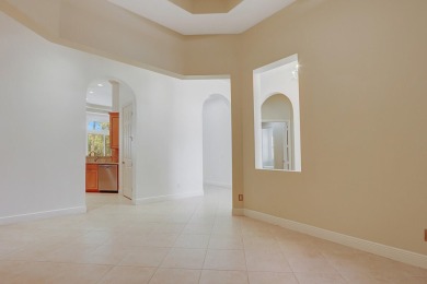 SPECTACULAR GOLF & WATER VIEWS! Nestled within the prestigious on The Legacy Golf and Tennis Club in Florida - for sale on GolfHomes.com, golf home, golf lot
