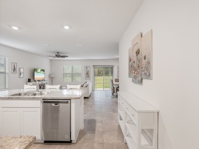 Charming 4BR/2BA home in a gated community where nature meets on Sandridge Golf Course and Club in Florida - for sale on GolfHomes.com, golf home, golf lot