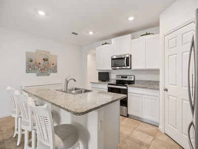 Charming 4BR/2BA home in a gated community where nature meets on Sandridge Golf Course and Club in Florida - for sale on GolfHomes.com, golf home, golf lot