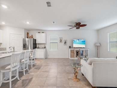 Charming 4BR/2BA home in a gated community where nature meets on Sandridge Golf Course and Club in Florida - for sale on GolfHomes.com, golf home, golf lot