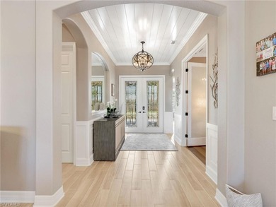 Exquisite Summerville Lake View Home in Bonita National Golf & on Bonita National Golf Course in Florida - for sale on GolfHomes.com, golf home, golf lot