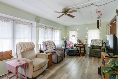 Ready for some Fun in the Sun! Welcome to Barefoot Bay! Adorable on Barefoot Bay Golf Course in Florida - for sale on GolfHomes.com, golf home, golf lot