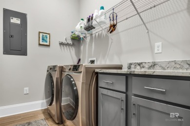This beautiful, contemporary craftsman home with over $200,000 on Peninsula Golf and Racquet Club in Alabama - for sale on GolfHomes.com, golf home, golf lot