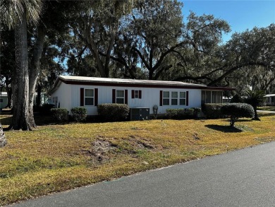 PRICE CORRECTION!! 2/2 double-wide with a huge family room on Continental Country Club in Florida - for sale on GolfHomes.com, golf home, golf lot