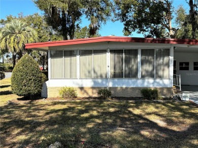 PRICE CORRECTION!! 2/2 double-wide with a huge family room on Continental Country Club in Florida - for sale on GolfHomes.com, golf home, golf lot