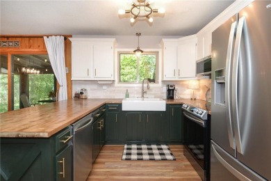 Adorably updated Rambler located in Voyager Village! This on Voyager Village Country Club - Voyager in Wisconsin - for sale on GolfHomes.com, golf home, golf lot