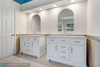Serene lake views, sunlit living spaces, and a private backyard on Delaire Golf and Country Club in Florida - for sale on GolfHomes.com, golf home, golf lot