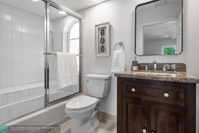 Serene lake views, sunlit living spaces, and a private backyard on Delaire Golf and Country Club in Florida - for sale on GolfHomes.com, golf home, golf lot
