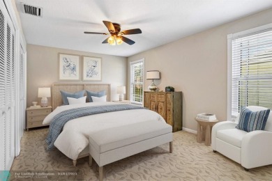 Serene lake views, sunlit living spaces, and a private backyard on Delaire Golf and Country Club in Florida - for sale on GolfHomes.com, golf home, golf lot