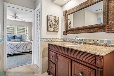 Serene lake views, sunlit living spaces, and a private backyard on Delaire Golf and Country Club in Florida - for sale on GolfHomes.com, golf home, golf lot