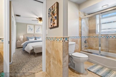 Serene lake views, sunlit living spaces, and a private backyard on Delaire Golf and Country Club in Florida - for sale on GolfHomes.com, golf home, golf lot
