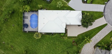 Beautiful 3/2/2 pool home located on oversized lot on the golf on Meadowood Golf and Tennis Club in Florida - for sale on GolfHomes.com, golf home, golf lot