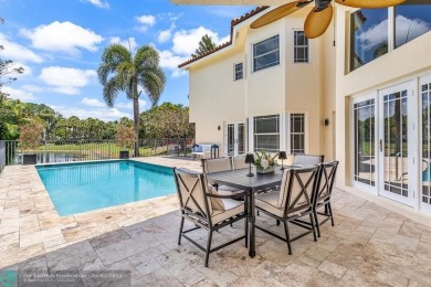 Serene lake views, sunlit living spaces, and a private backyard on Delaire Golf and Country Club in Florida - for sale on GolfHomes.com, golf home, golf lot