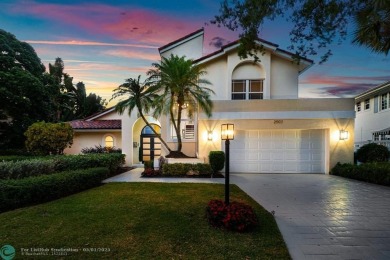 Serene lake views, sunlit living spaces, and a private backyard on Delaire Golf and Country Club in Florida - for sale on GolfHomes.com, golf home, golf lot