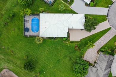 Beautiful 3/2/2 pool home located on oversized lot on the golf on Meadowood Golf and Tennis Club in Florida - for sale on GolfHomes.com, golf home, golf lot