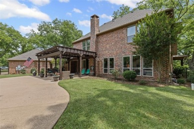 Impressive 3,066 SF custom home with heavily treed lot poised on on Nutcracker Golf Club in Texas - for sale on GolfHomes.com, golf home, golf lot