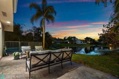 Serene lake views, sunlit living spaces, and a private backyard on Delaire Golf and Country Club in Florida - for sale on GolfHomes.com, golf home, golf lot
