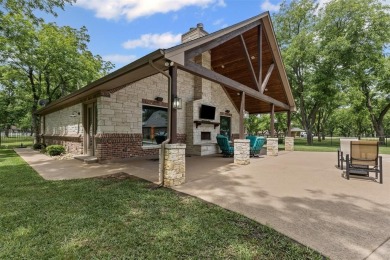 Impressive 3,066 SF custom home with heavily treed lot poised on on Nutcracker Golf Club in Texas - for sale on GolfHomes.com, golf home, golf lot