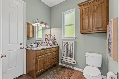 Impressive 3,066 SF custom home with heavily treed lot poised on on Nutcracker Golf Club in Texas - for sale on GolfHomes.com, golf home, golf lot