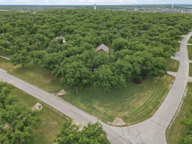 Impressive 3,066 SF custom home with heavily treed lot poised on on Nutcracker Golf Club in Texas - for sale on GolfHomes.com, golf home, golf lot