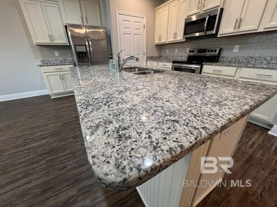 Welcome to this beautifully crafted home built in 2019 to Gold on The Golf Club of the Wharf in Alabama - for sale on GolfHomes.com, golf home, golf lot