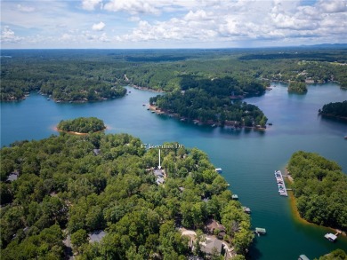 Newly renovated with stunning seasonal lake and sunset views on Keowee Key Golf and Country Club in South Carolina - for sale on GolfHomes.com, golf home, golf lot